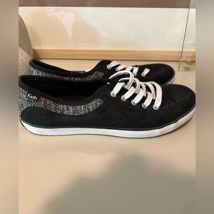 Black and grey keds